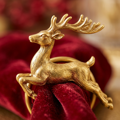 Detail Image 1 - Macro close-up of single reindeer napkin ring showing brushed gold finish